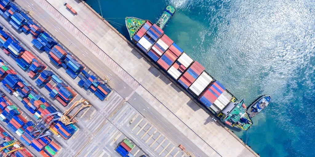 Aerial view of a container ship docked in the Panama Canal