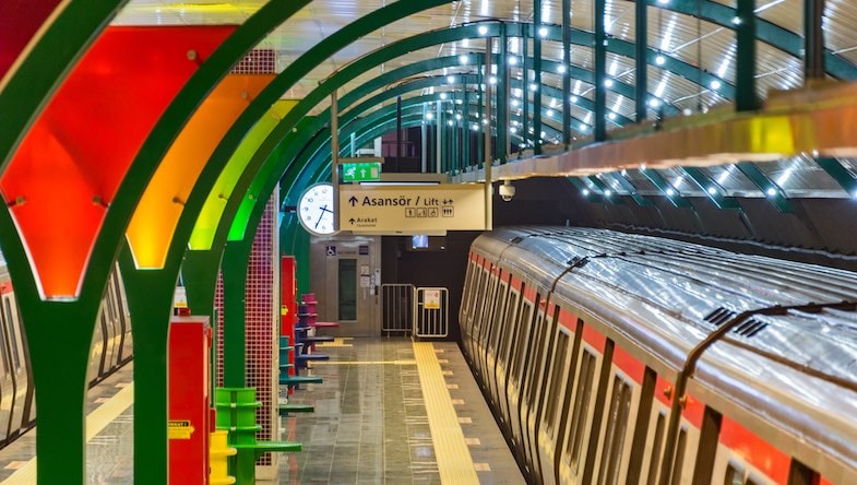 A train passes through a station in the Istanbul Metro.