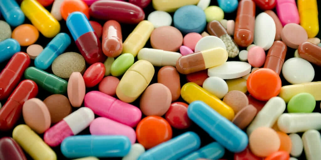 A bunch of multicolored pills