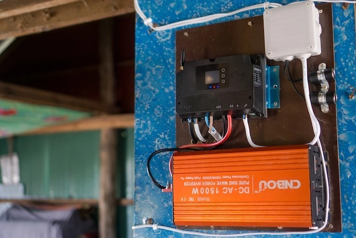 The Okra Pod, like this one installed in Cambodia, can connect to an inverter with AC outlets for powering full-size appliance