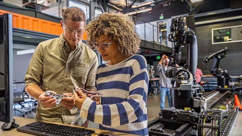 People working together in a robotics lab