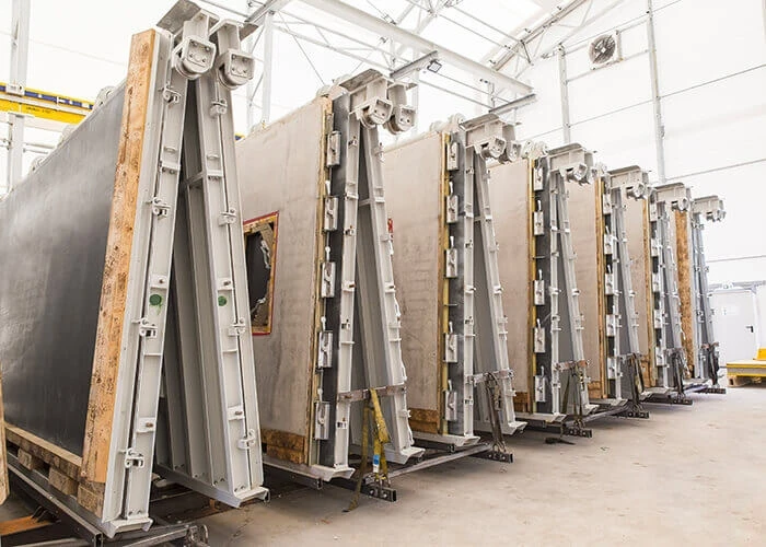 Prefabricated housing panels stored in a warehouse