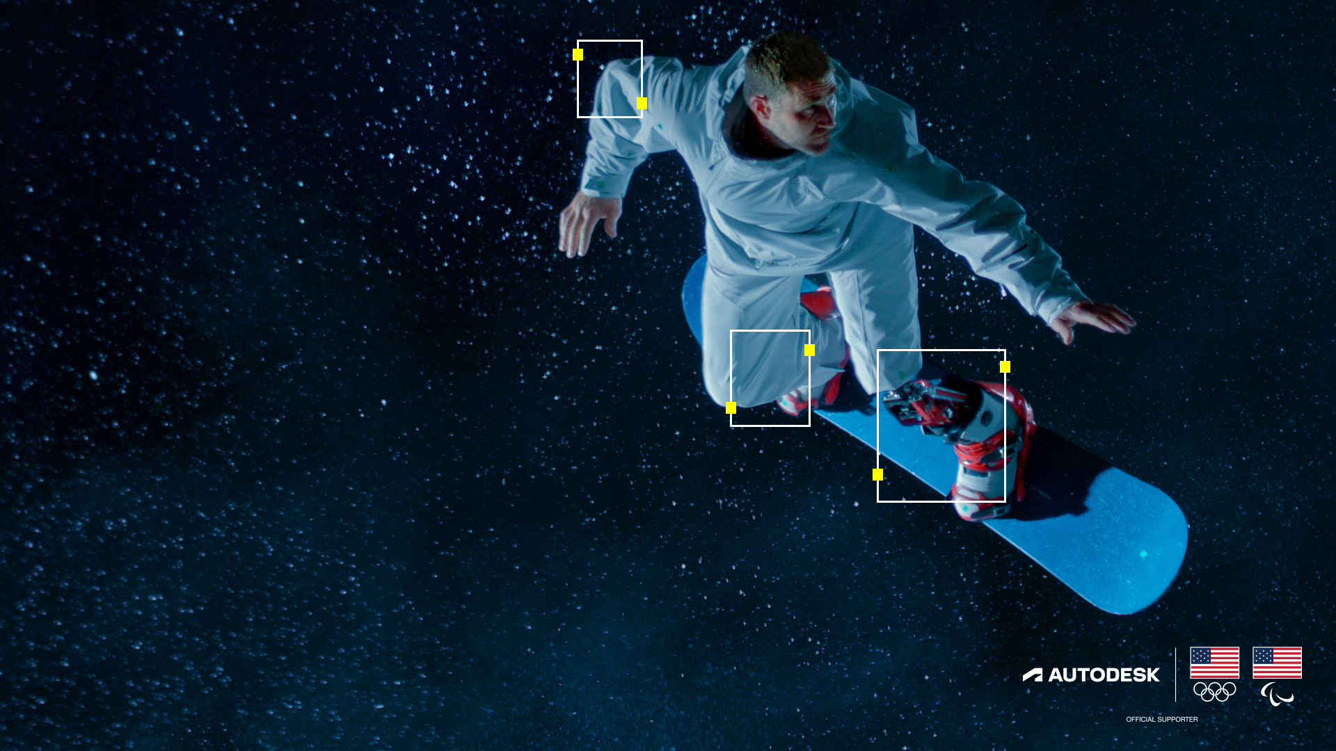 Mike Schultz mid-air on a snowboard