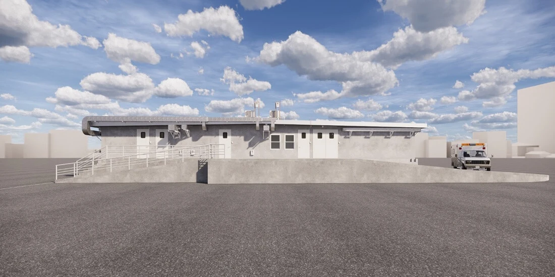 Exterior rendering of a modular hospital under a blue sky