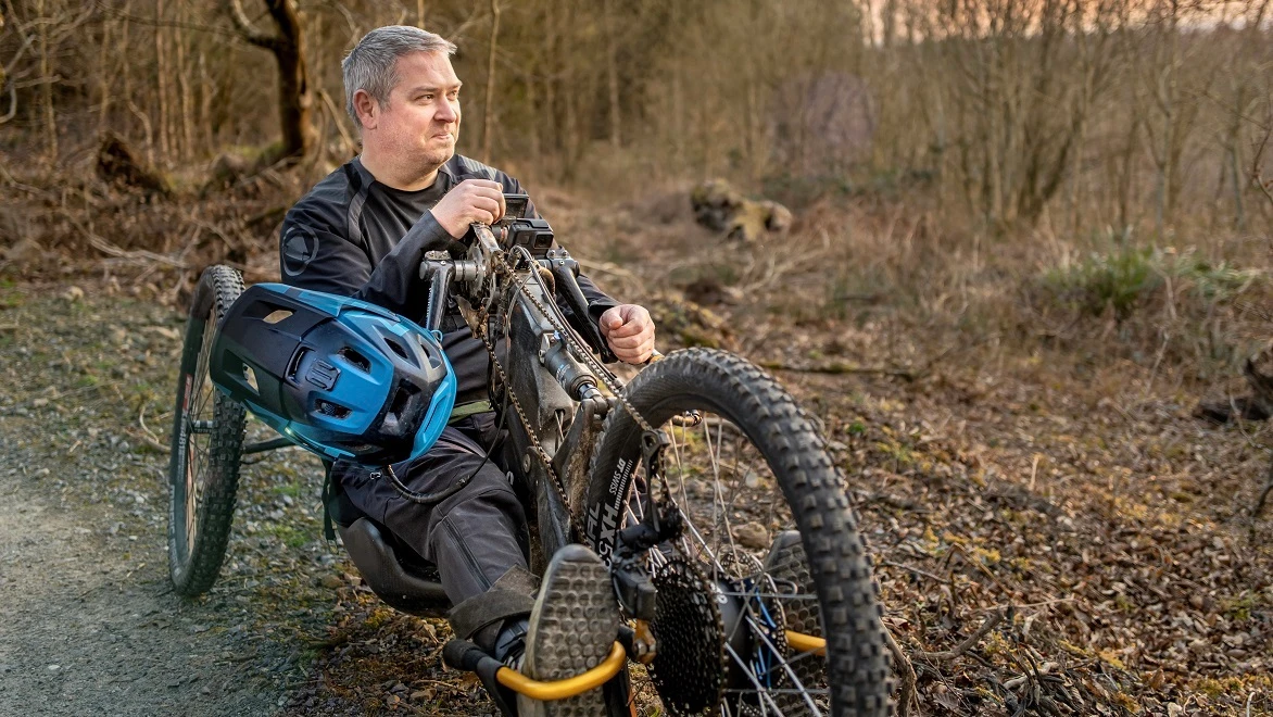 Noel Joyce sitting on adaptive mountain bike