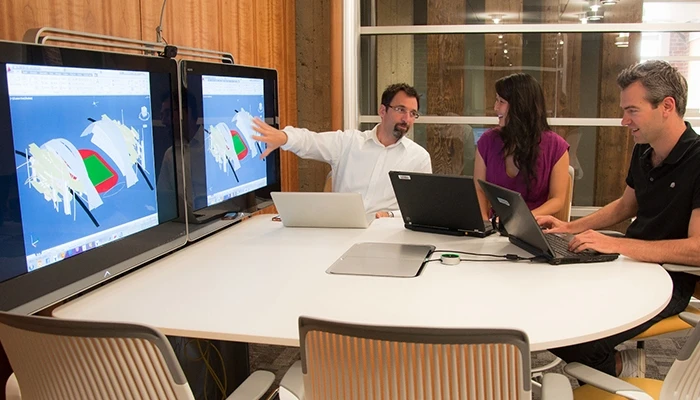 Architects work on a stadium design.