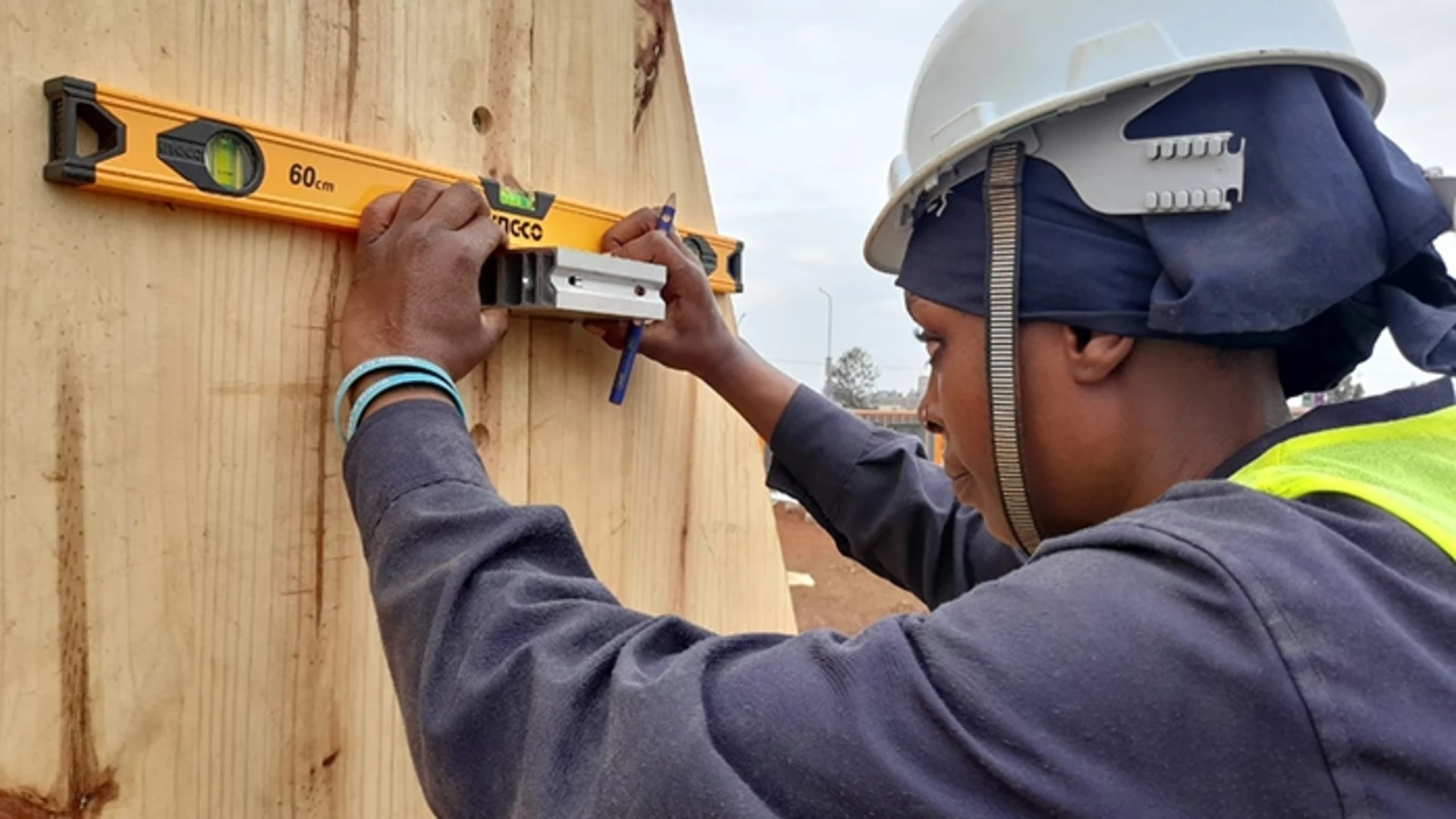 woman working in construction of Zima Homes