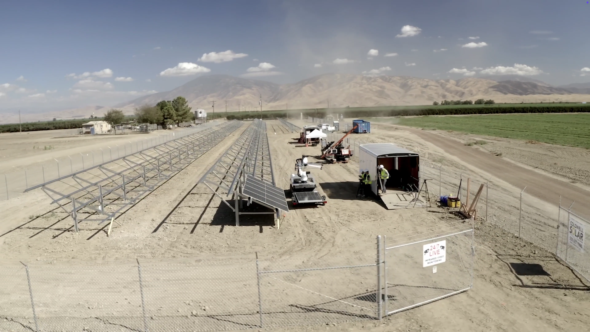 A Cosmic Robotics prototype working in a solar panel farm.