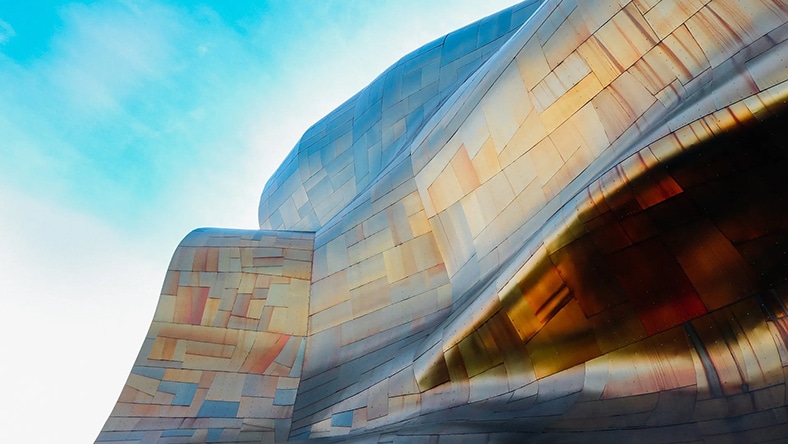 A metal building facade shows off its curves.