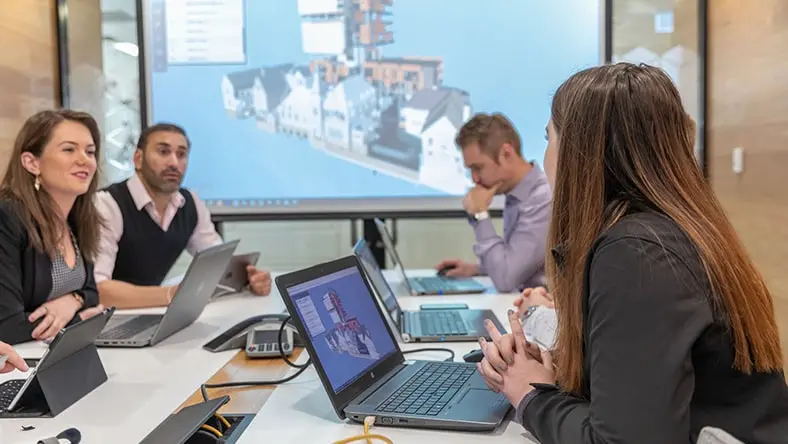 Owner evaluates bids for cost and merit