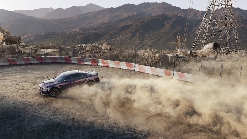 A still from a CGI car ad shows a car drifting into a turn with clouds of dust behind it.