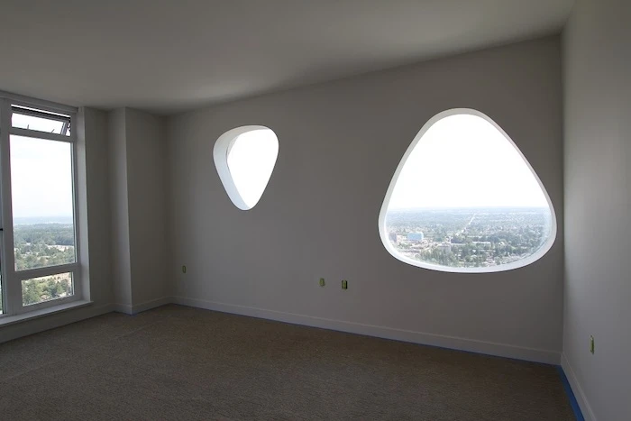 A room with guitar-pick shaped windows