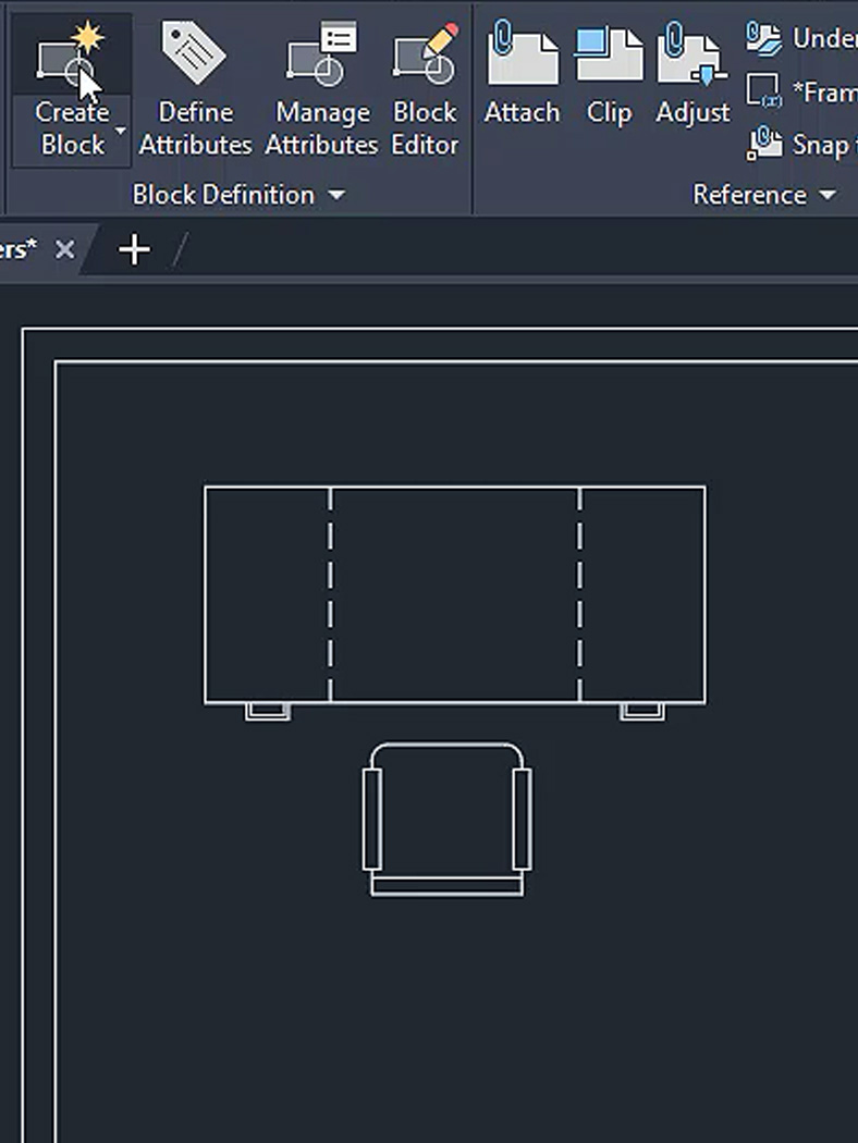 AutoCAD interface showing block creation tools and a simple furniture layout with a desk and chair in a dark workspace.