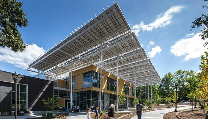 The Kendeda Building for Innovative Sustainable Design, a low-carbon development, features a green roof and a solar-panel canopy.