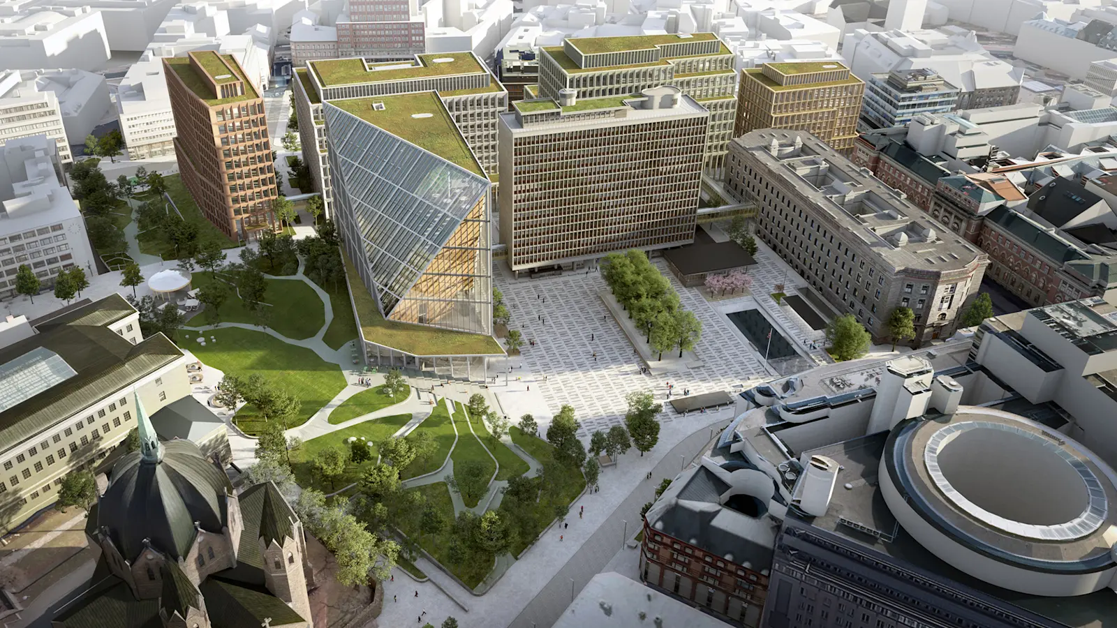 In un rendering, una vista aerea mostra un quartiere cittadino con edifici moderni circondati da spazi verdi e ampie aree pedonali.