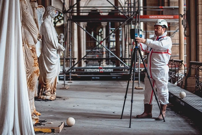 AGP engineer using laser scanner
