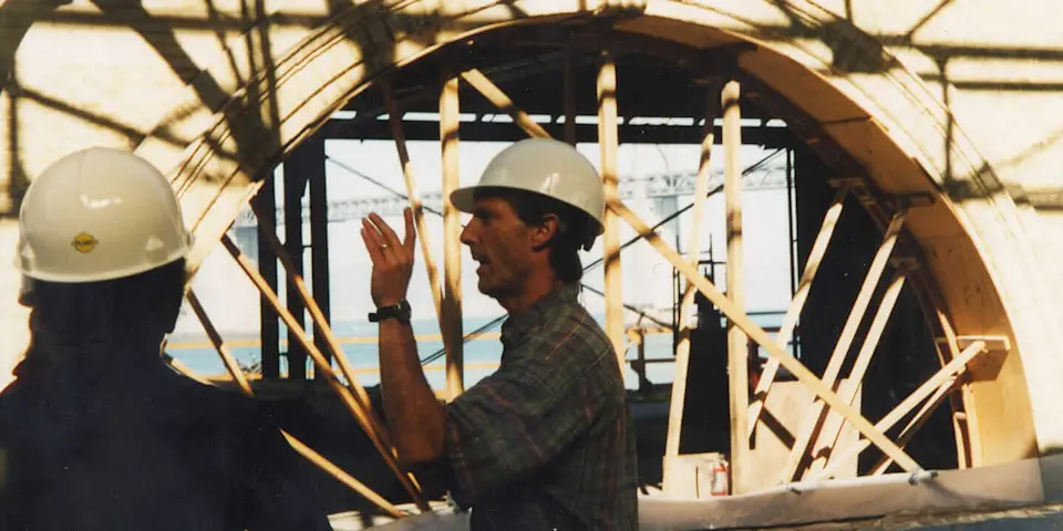 Construction workers in front of a window form on the construction site of the San Francisco Ferry Building circa early 2000s.
