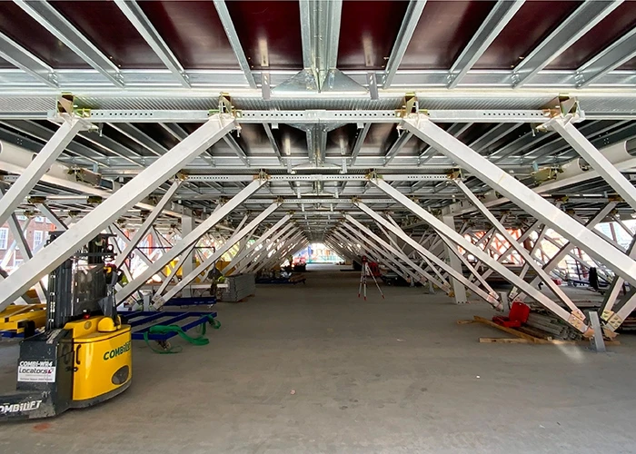 Forge components inside a concrete and steel frame