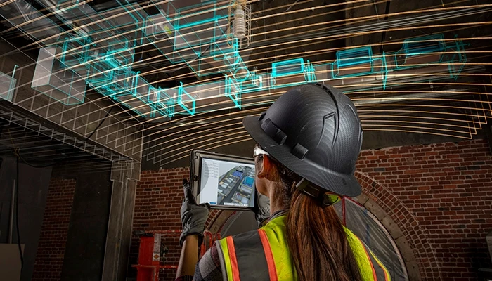 a construction worker with a digital overlay on a job site