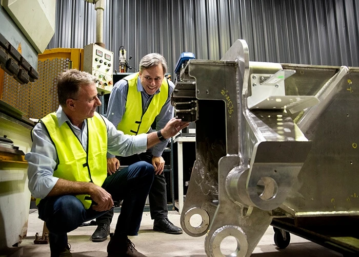 bricklaying robot fbr mike pivac and mark pivac inspect equipment