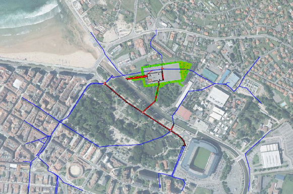 ArcGIS map of the Eastern Gijón catchment showing sewer network topology, hydraulic model elements, and the planned Hermanos Castro storm tank site.