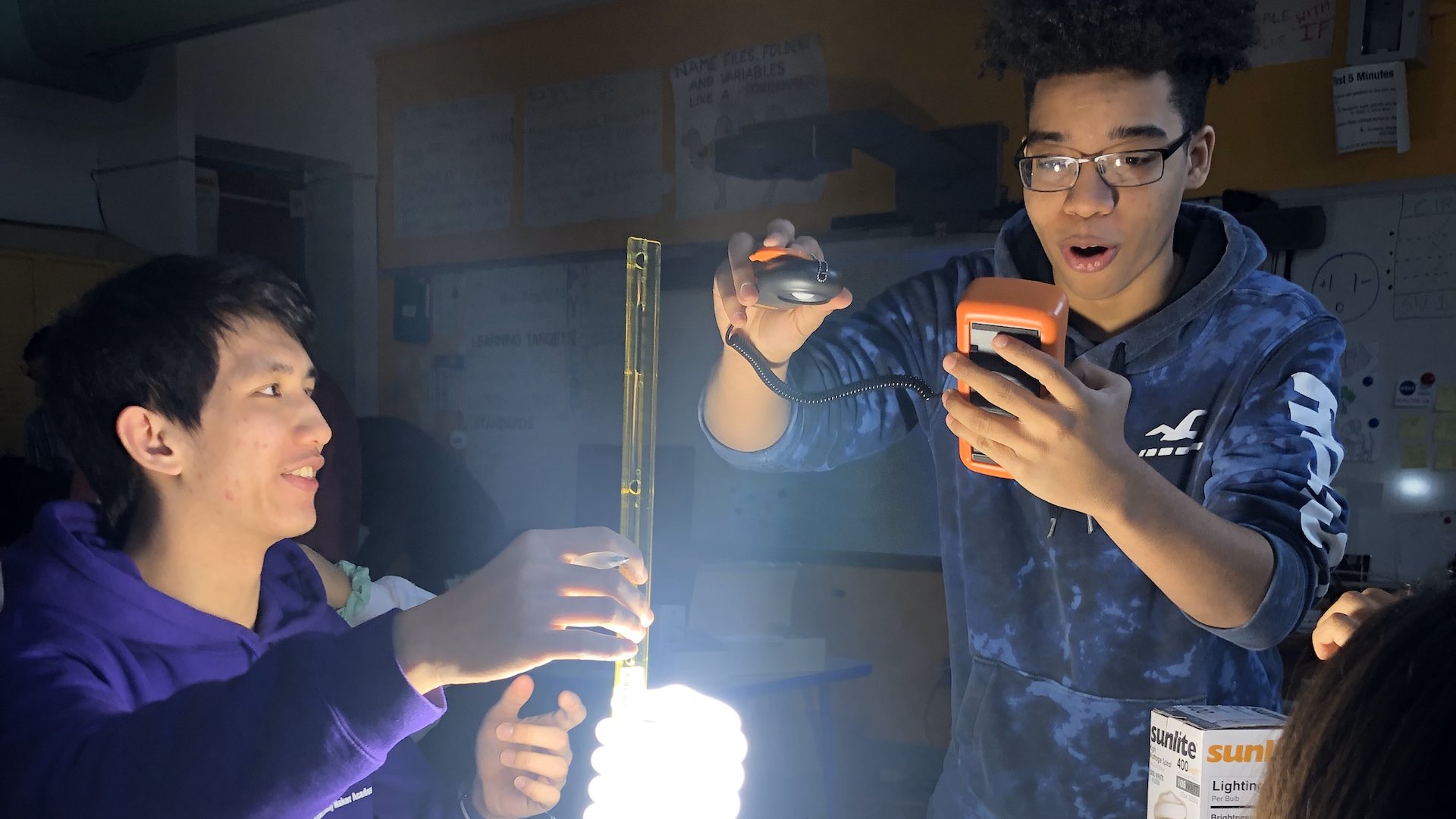 Stacks+Joules trainees using light measure equipment