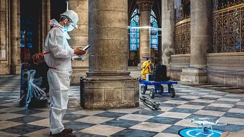 AGP engineers on-site at Notre-Dame collecting 3D data using a drone