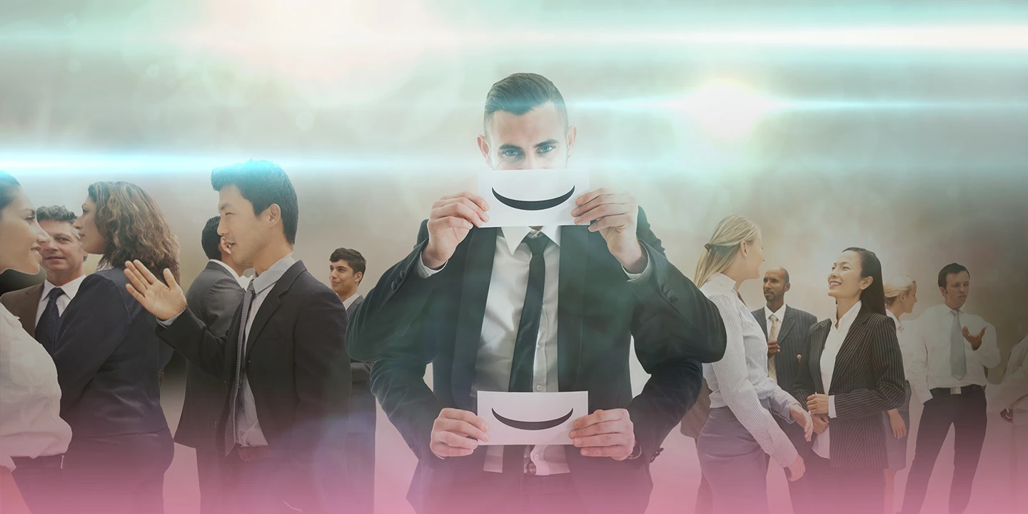 Image composite of a man holding a paper smile