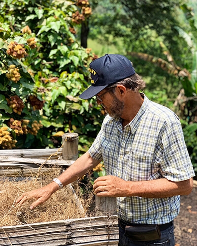Image of Juan David Hurtado on coffee farm.