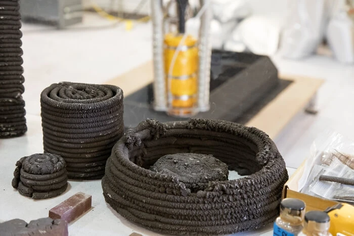 NASA’s Swamp Works innovation lab simulates lunar regolith using Black Point 1, a waste product of asphalt production.