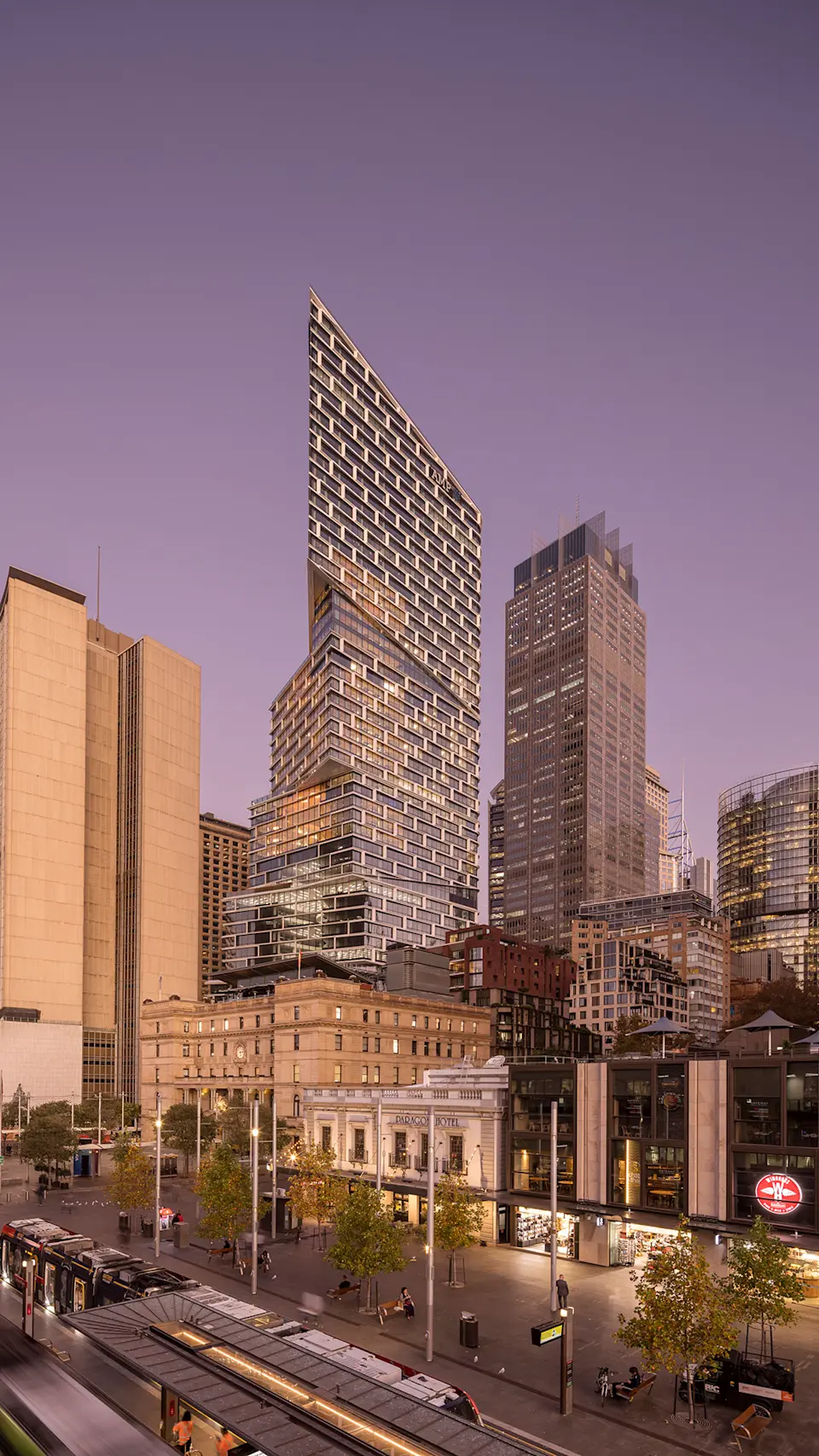 The Quay Quarter Tower is surrounded by skyscrapers in the Sydney skyline