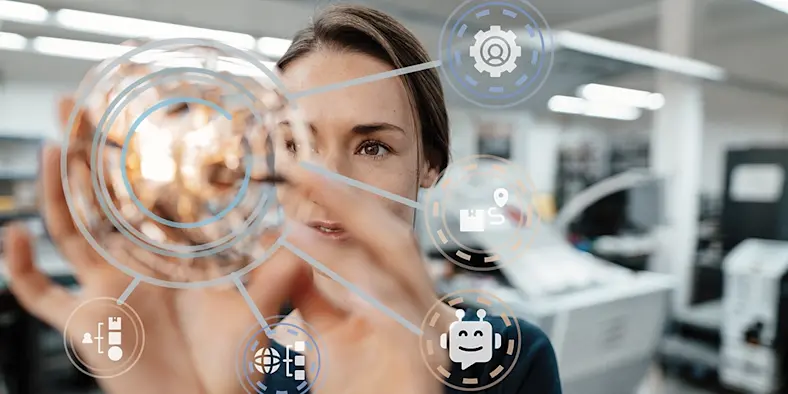 Collage image of woman manipulating a digital graphic overlay manufacturing trends 2022