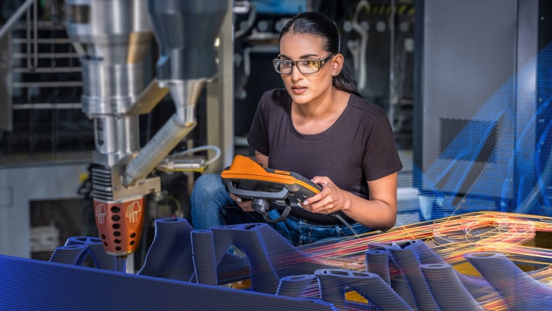 Robotic arms on an automated assembly line in an automotive plant.