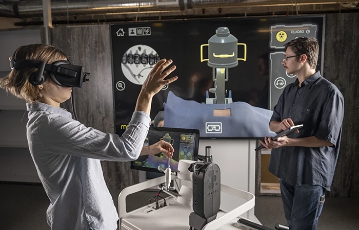 Two people use VR for employee trainings