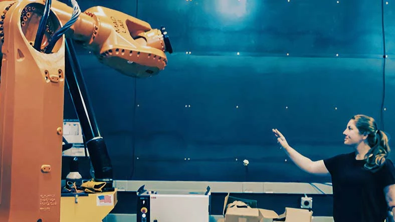 Mimus is an industrial robot programmed to explore and roam
