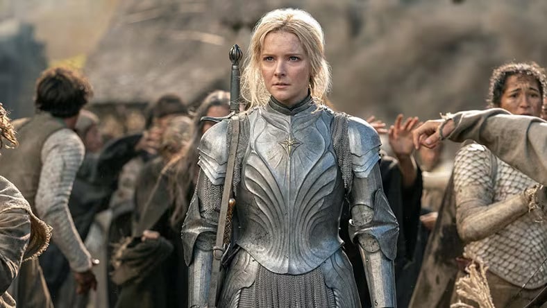 A woman is dressed in Medieval armour.
