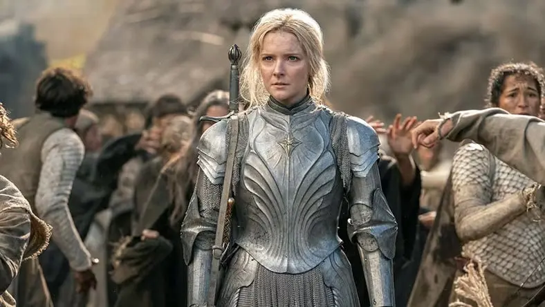 A woman is dressed in Medieval armour.
