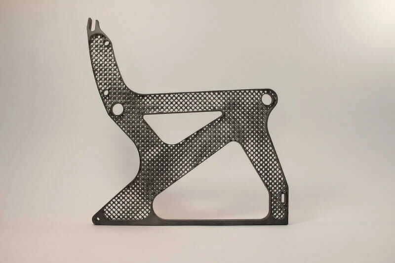 Magnesium airplane-seat frame with a latticed design developed with generative design.