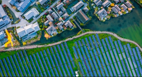 aerial view of buildings and solar panels
