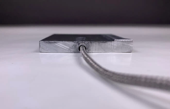 Das Ergebnis: ein mittels Kaltmetallfusion auf ein TrĆ¤germetall angebrachter Sensor. Mit freundlicher Genehmigung von Tri-D Dynamics.