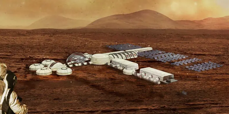 a composite image of an astronaut looking down into a valley on Mars with circular buildings and solar panel farm