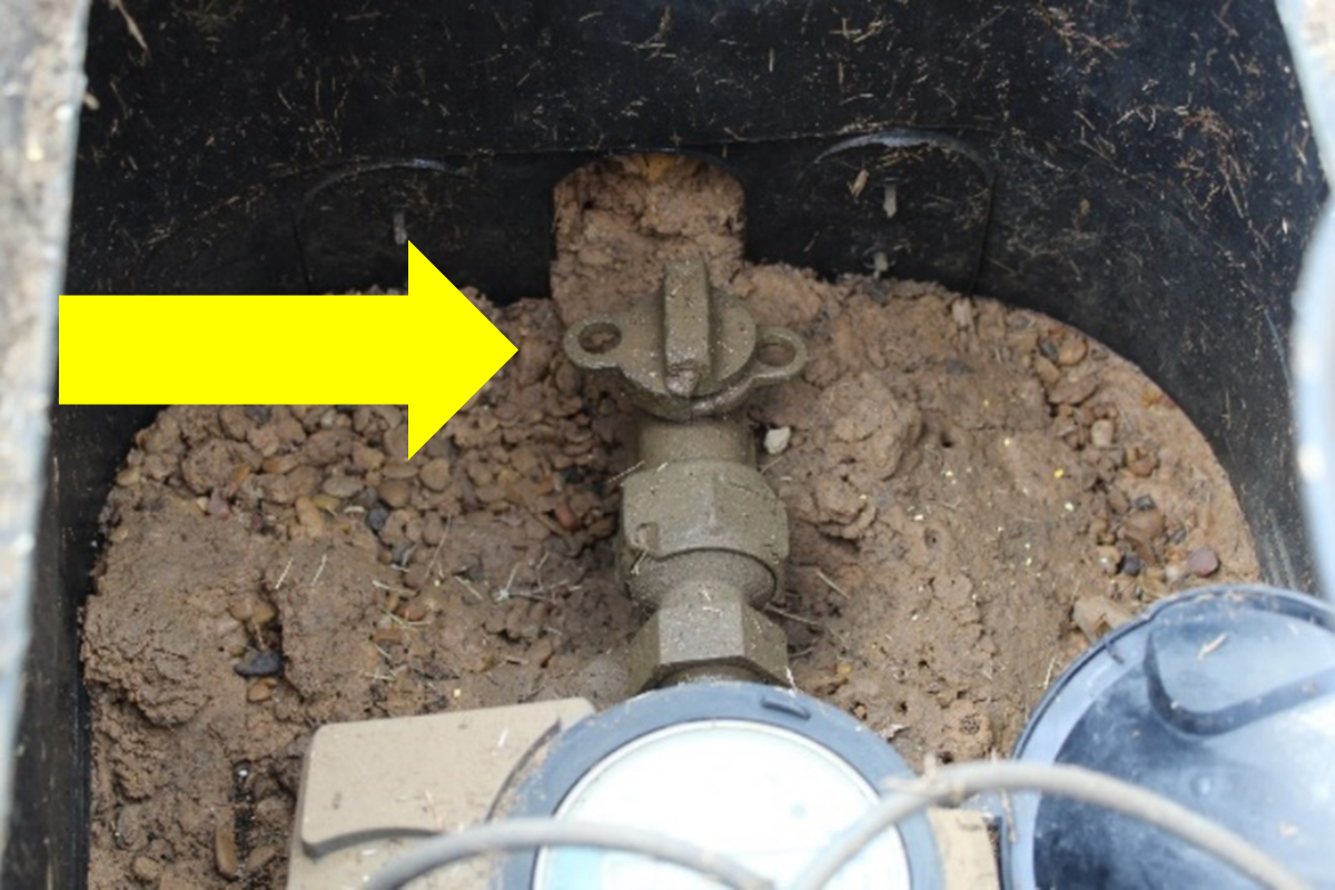 To turn off water to your home, turn the valve at the water meter, as indicated by the yellow arrow, one quarter turn. Then open faucets to drain water.