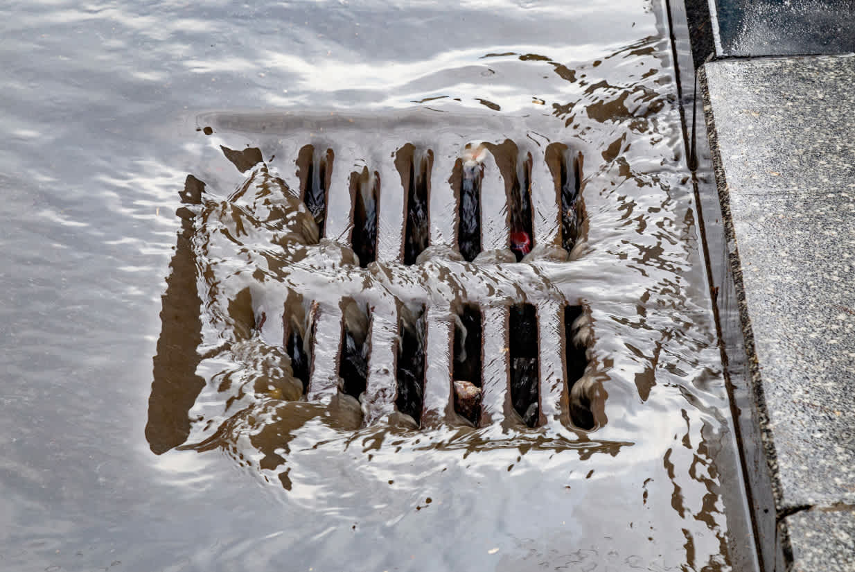 stormwater flowing into a drain