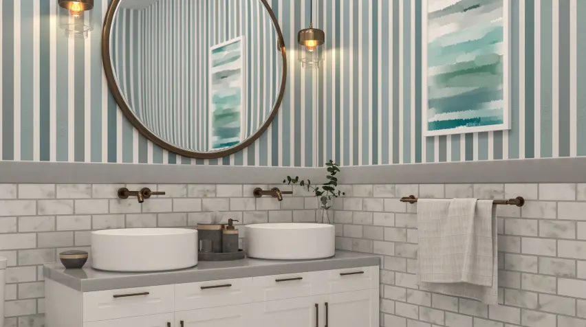 A neutral, well-decorated bathroom with striped wallpaper in blues and greens and matching artwork on the wall.