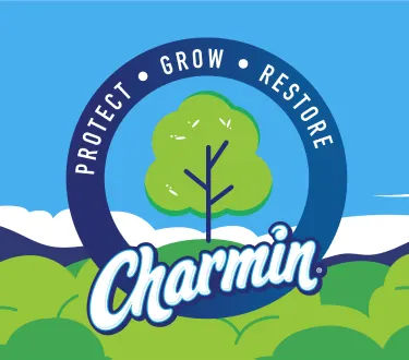 Charmin Protect - Grow - Restore logo nestled on top of treetops