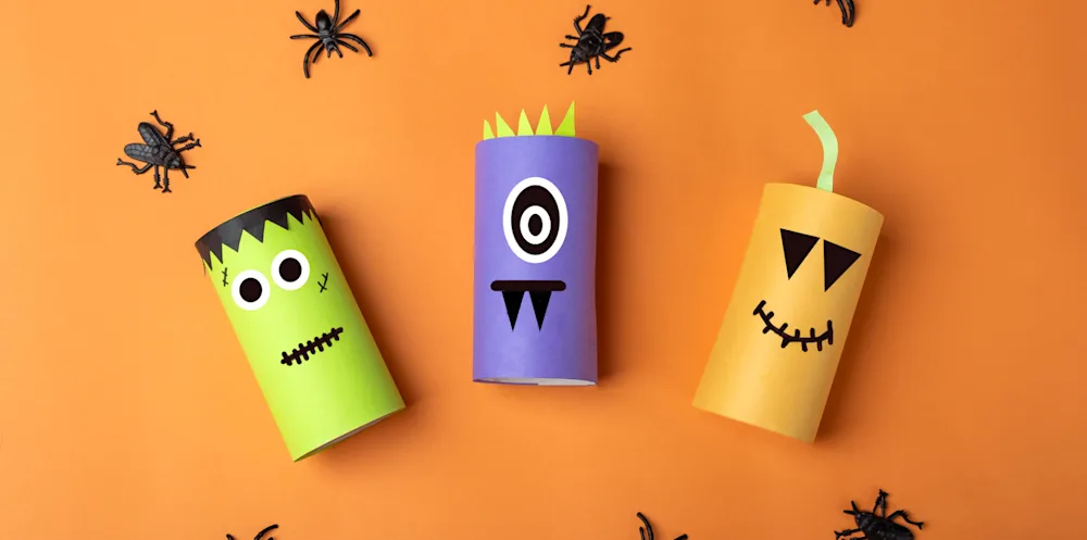 Toilet paper rolls painted and decorated as Halloween characters