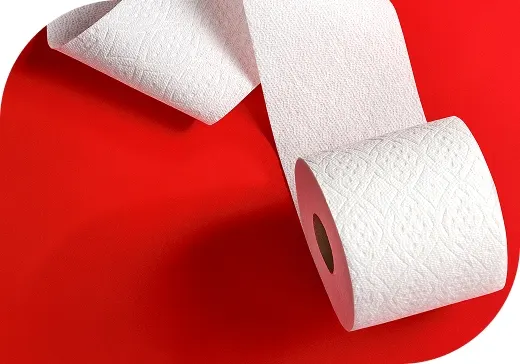 Un rouleau de Charmin Ultra Résistant est déroulé sur le plancher en un motif ondulé
