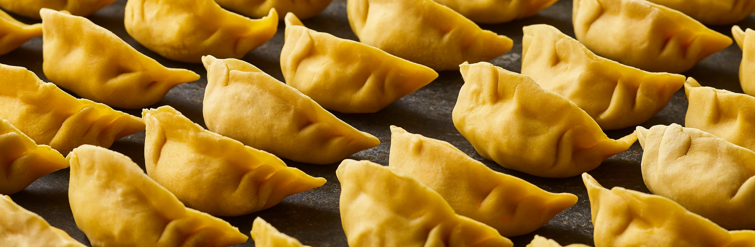 Yellow dumplings with natural yellow color Chinese jioazi with natural yellow food color