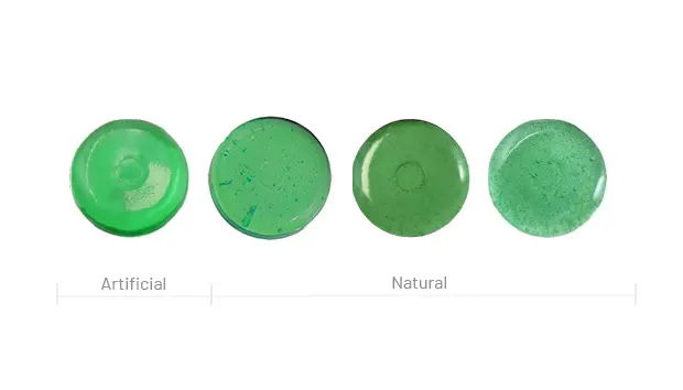 From Left to Right, these hard candies are colored with FD&C Yellow #5 + FD&C Blue #1 (Tartrazine / Brilliant Blue), safflower + spirulina, broad-leaf plant, turmeric + spirulina, jagua fruit + turmeric.
