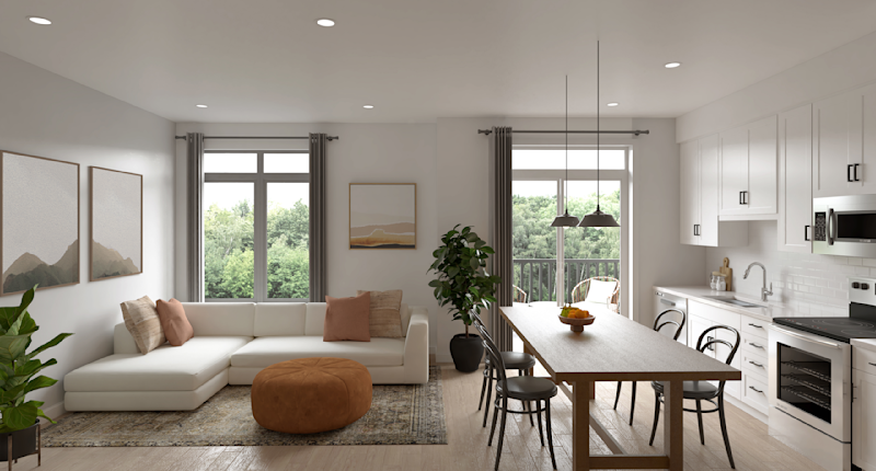 A luxury living room and kitchen in a Birches home
